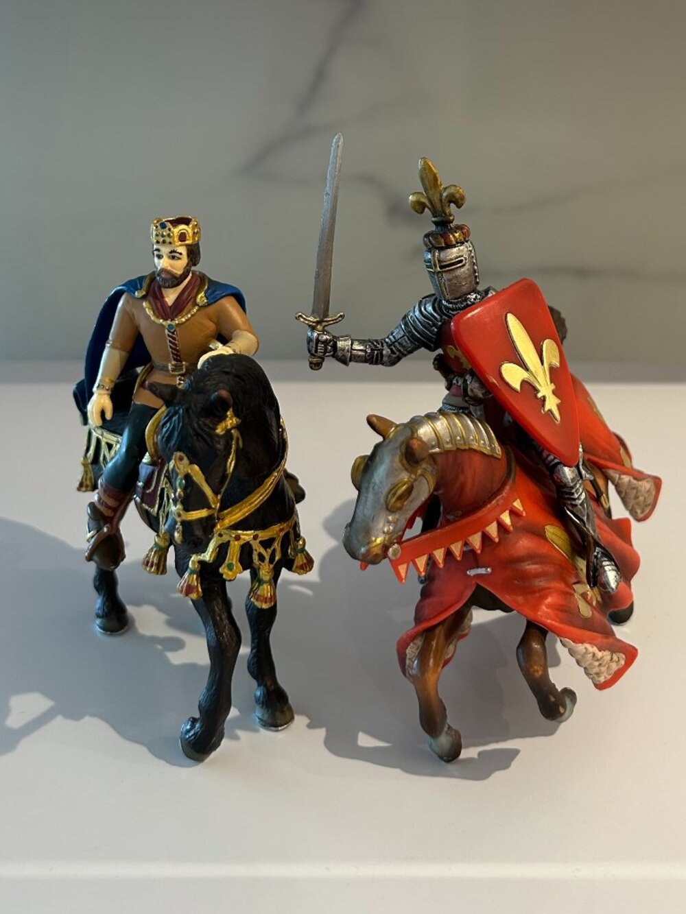 Schleich: King on Horseback (70049) and Prince on Reared Horse Red (70018)